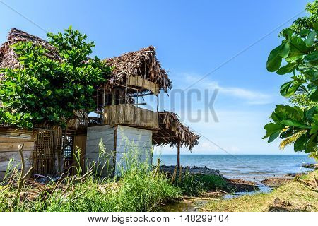Tropical beachside bar on Caribbean beach, Livingston, Guatemala