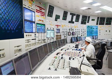 KURCHATOW, RUSSIA - JUNE 23, 2016: The operator monitors the readings of devices and work equipment. Central control unit of Kursk NPP.