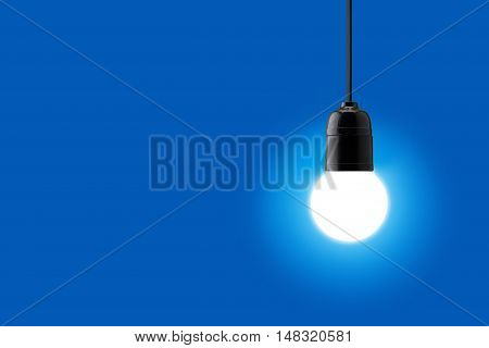 The Light bulb on a blue background
