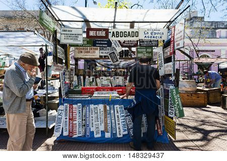 Buenos Aires Argentina - October 6 2013: People in a street market in the San Telmo neighborhood in the city of Buenos Aires in Argentina