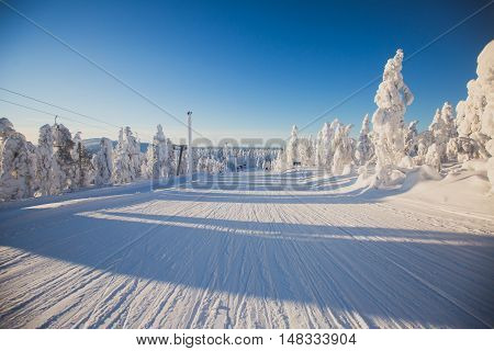 Beautiful Cold Mountain View Of Ski Resort, Sunny Winter Day With Slope, Piste And Ski Lift