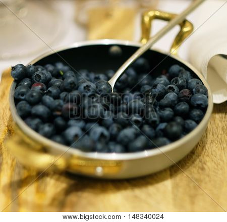 Bowl of bilberries or blueberries, Healthy food Bilberries in a bowl, blueberries in a bowl. Fresh blueberries close up. Bilberries close up