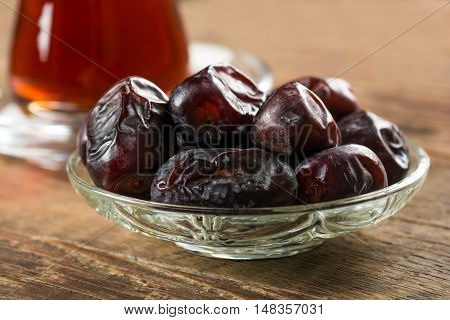 Tea with dates. Tea time. Selective focus