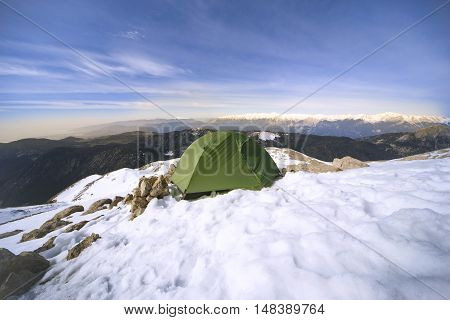 Camping on the top of the mountain in winter.