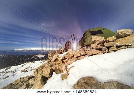 Camping on the top of the mountain in winter.