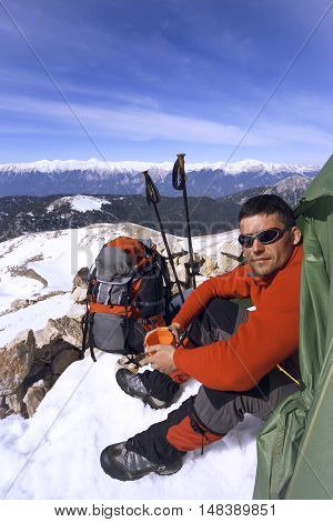 Camping on the top of the mountain in winter.