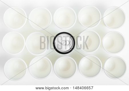 Few Glasses of Environmentally Friendly Paper that having in its Surface a beautiful Texture and a beverage can in the middle photographed from above to make a flat lay composition