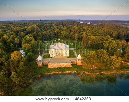 Trakai, Lithuania: Aerial UAV top view of Uzutrakis Palace in the autumn sunset