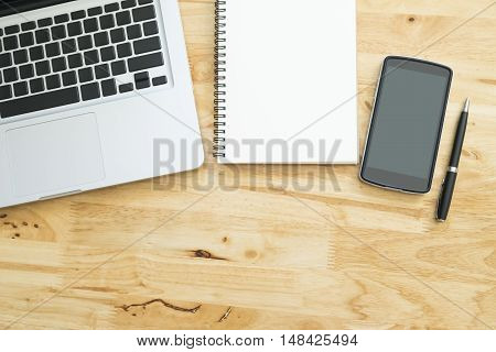 Top View Of Office Wooden Desktop With Analyze Chart, Computer Laptop And Blank White Notebook.top V