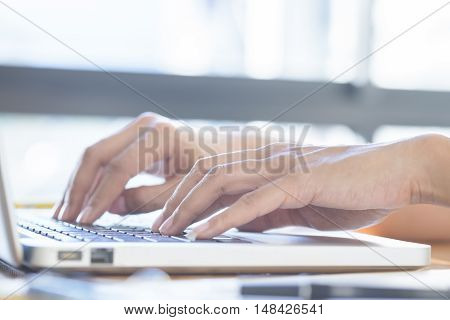 Asian Woman Using Laptop To Online Shopping.(selective Focus)