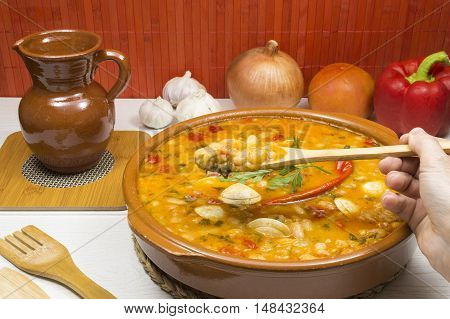 white beans with clams and vegetables on the table