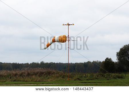 Wind cone for a directionfinding and strength of wind near earth