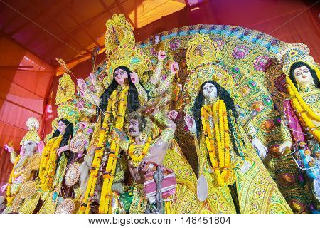 KOLKATA INDIA - OCTOBER 21 2015 : Beautiful interior of decorated Durga Puja pandal at Kolkata West Bengal India. Durga Puja is biggest religious festival of Hinduism.
