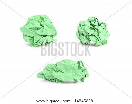 Closeup group of green crumpled paper isolated on white background
