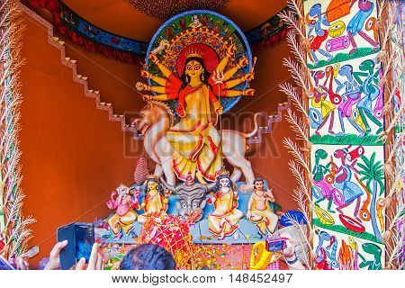 KOLKATA INDIA - OCTOBER 21 2015 : Beautiful interior of decorated Durga Puja pandal at Kolkata West Bengal India. Durga Puja is biggest religious festival of Hinduism.