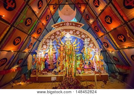 KOLKATA INDIA - OCTOBER 21 2015 : Beautiful interior of decorated Durga Puja pandal at Howrah West Bengal India. Durga Puja is biggest religious festival of Hinduism.