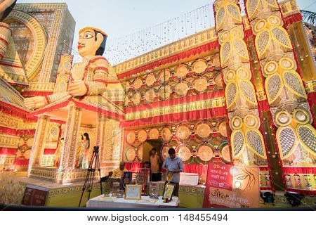 KOLKATA INDIA - OCTOBER 21 2015 : Beautiful exterior of decorated Durga Puja pandal at Kolkata West Bengal India. Durga Puja is biggest religious festival of Hinduism.