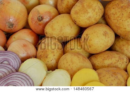 mix of fresh sliced and whole potatoes and onions