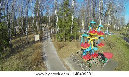 Childrens playground among the trees in a health camp for children, aerial view