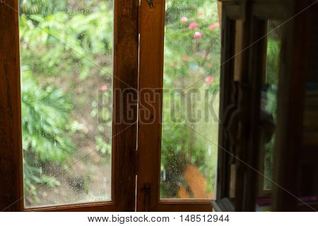 Rain Drops On Mirror Window