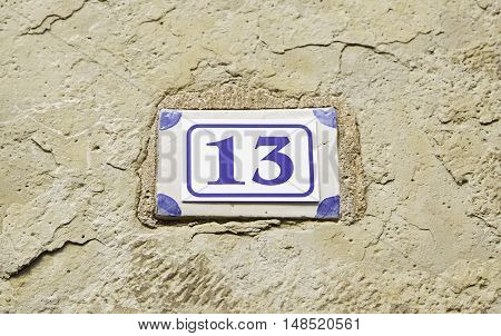 Number Thirteen On A Wall Detail Of A Number Of Information Odd Number Superstition