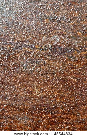 Rough rust texture close up in vertical 3:2 format.