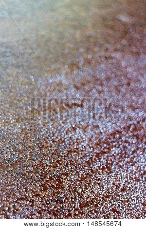 Rough rust texture close up in vertical 3:2 format. Selective focus.