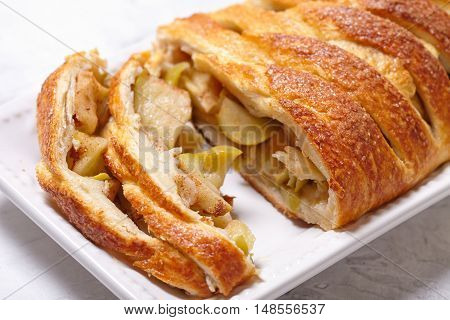 Delicious apple strudel with cinnamon pie spices