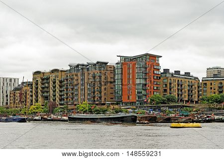 LONDON, ENGLAND - JULY 8, 2016: Bermondsey riverside - Prividence Square Providence Tower Springalls Wharf Apartments Tempus Wharf.