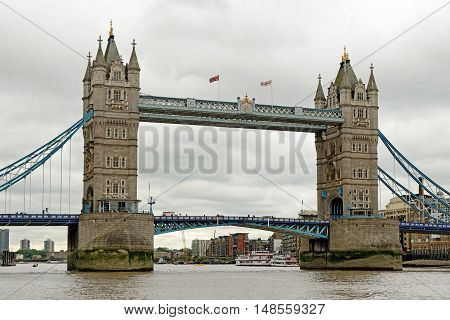 Tower Bridge a combined bascule and suspension bridge in London England built in 1886-1894. It has become an iconic symbol of London.