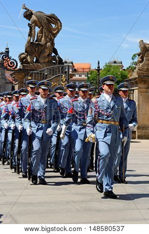 PRAGUE, CZECH REPUBLIC - JULY 4, 2014: Castle guards (Hradni straz) of presidential palace during ceremonial changing of guards. It takes place daily at noon accompanied by a brass band.