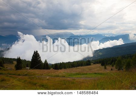 Dramatic evening in Gerlitzen Apls before stormAustria.Inverse weather and view of the mountains in Slovenia.
