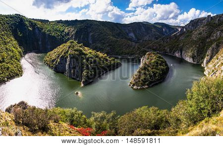 Meanders at rocky river Uvac gorge on sunny day, southwest Serbia.
