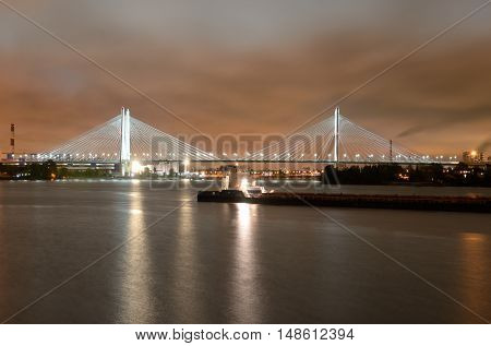 Cable-stayed bridge with illumination across the Neva River in St.Petersburg Russia.