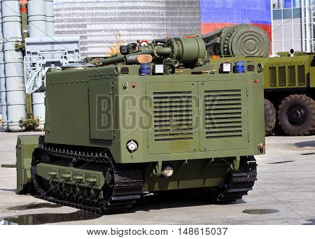 Unmanned ground combat vehicle for remote-controlled demining