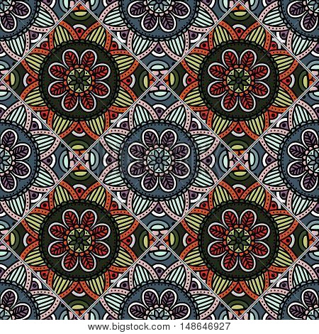 Colorful floral seamless pattern from different rhombus with mandala in patchwork boho chic style, in portuguese and moroccan motif. Hand drawn vector stock illustration