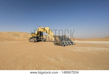 Abandoned Excavator in Liwa desert near Abu Dhabi