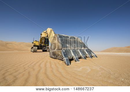 Abandoned Excavator in Liwa desert near Abu Dhabi