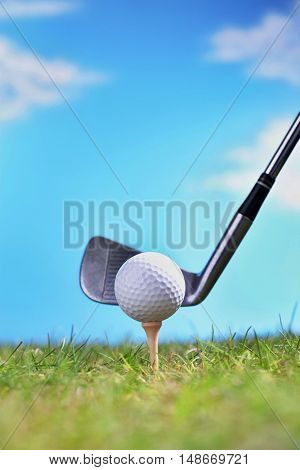 Golf Club Teeing Off Ball