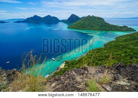 View on top of Bohey Dulang island near Sipadan Island,Sabah,Borneo.Tropical paradise island with bright smooth mirror sand & crystal clear water with rocky shore in the island of Semporna,Borneo