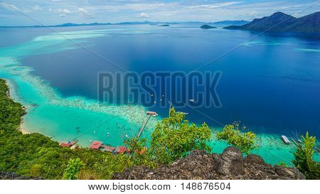 View on top of Bohey Dulang island near Sipadan Island,Sabah,Borneo.Tropical paradise island with bright smooth mirror sand & crystal clear water with rocky shore in the island of Semporna,Borneo