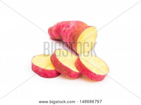 Sweet potato and slice on white background