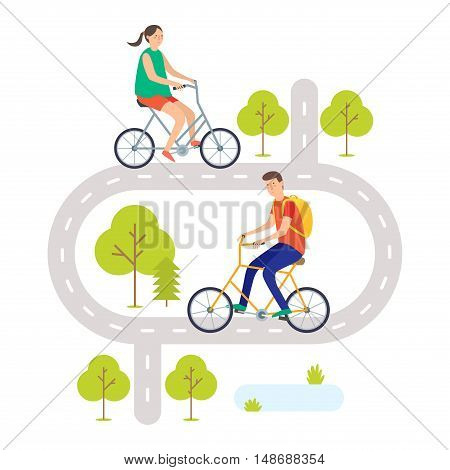 A young man and young woman ride bikes on the road. Cyclists. Cycling.