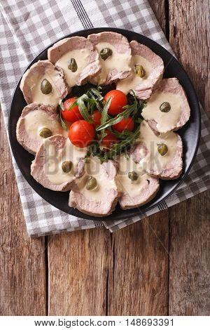 Italian Cuisine: Vitello Tonnato With Capers, Arugula, Tomatoes Close-up. Vertical Top View