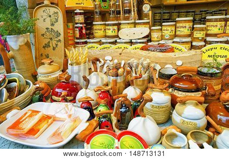 Stall With Ceramics And Honey Products At Riga Christmas Market