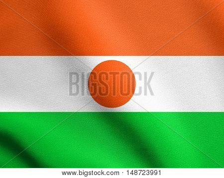 Nigerien national official flag. African patriotic symbol banner element background. Flag of Niger waving in the wind with detailed fabric texture, illustration