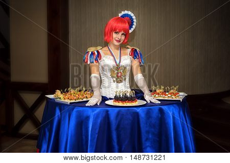 Moscow, Russia - September 18, 2016: Charming Lady Buffet, Who Dress Is Stylized Russian National Co