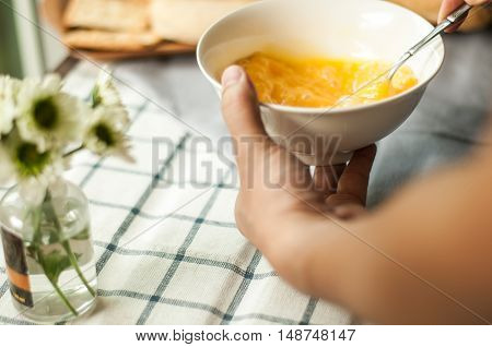 egg prepare for cooking, on the tablecloth and mum flower