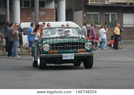 BELGRADE,SERBIA - SEPTEMBER 10, 2016: Old Triumph TR6 at the commercial race of old cars in memory of formula 1 race held on the same place in 1939 two days after the beginning of Second World War when the famous Italian driver Tazio Nuvolari won