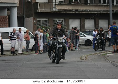 BELGRADE,SERBIA - SEPTEMBER 10, 2016: Oldtimer motorcycle at the commercial race of old cars in memory of formula 1 race held on the same place in 1939 two days after the beginning of Second World War when the famous Italian driver Tazio Nuvolari won